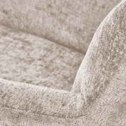 Poltrona a dondolo imbottita in tessuto beige Isla