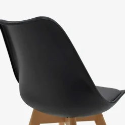 Sedia da pranzo scandinava polipropilene nero cuscino similpelle gambe legno Riccia